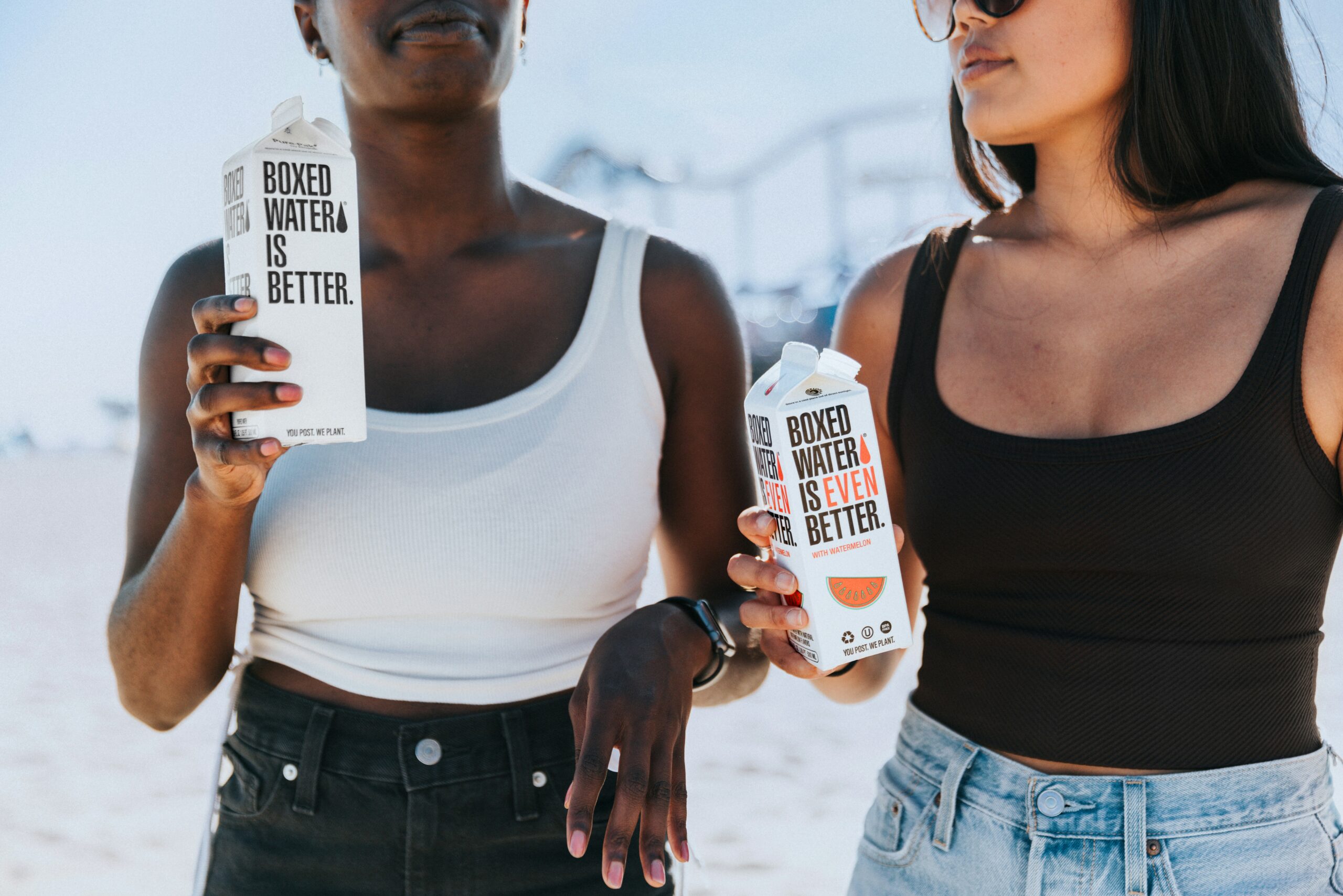 a couple of women standing next to each other